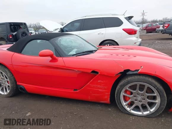 2005 Dodge Viper SRT-10 with VIN 1B3JZ65Z25V500516, listed as a IAAI auction lot 42000783 with 13,090 mi miles and . Bid and sale history available at DreamBid. Image 13.