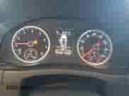 2014 Volkswagen Tiguan S z VIN WVGAV3AX8EW556155, wystawiony jako Copart lot #67572205 z przebiegiem 151 963 mil mil oraz Szkoda całkowita • Salvage title. Historia ofert i sprzedaży dostępna na DreamBid. Obrazek 9.