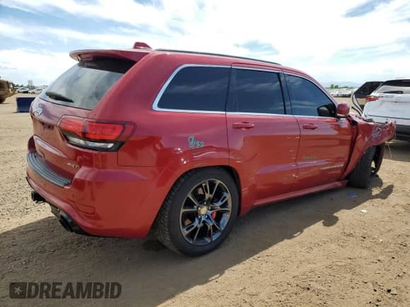 2014 Jeep Grand Cherokee SRT-8 z VIN 1C4RJFDJ4EC202579, wystawiony jako Copart lot #62811605 z przebiegiem 83 024 mil mil oraz Szkoda całkowita • Salvage title. Historia ofert i sprzedaży dostępna na DreamBid. Obrazek 3.