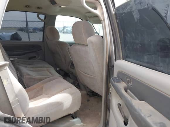 2003 Chevrolet Tahoe LT z VIN 1GNEC13Z73R150725, wystawiony jako IAAI lot #41814643 z przebiegiem Nie podano mil oraz . Historia ofert i sprzedaży dostępna na DreamBid. Obrazek 8.