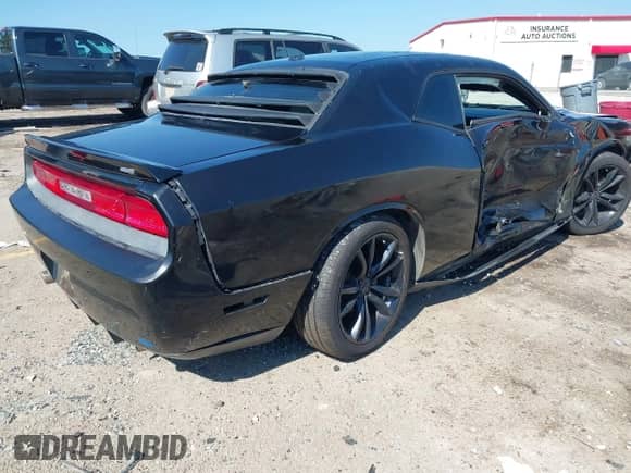 2012 Dodge Challenger R/T Plus with VIN 2C3CDYBTXCH137653, listed as a IAAI auction lot 43370417 with Not provided miles and . Bid and sale history available at DreamBid. Image 4.