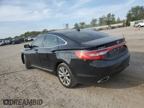 2014 Hyundai Azera with VIN KMHFG4JG7EA414236, listed as a Copart auction lot 71658544 with 143,404 mi miles and Salvage title. Bid and sale history available at DreamBid. Image 2.