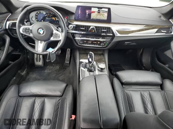 2018 BMW 5 Series M550i xDrive with VIN WBAJB9C53JB286164, listed as a Copart auction lot 71052315 with 91,157 mi miles and Clean title. Bid and sale history available at DreamBid. Image 8.