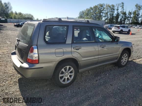2006 Subaru Forester X with VIN JF1SG65636H744311, listed as a Copart auction lot 63843955 with 108,108 mi miles and Salvage title. Bid and sale history available at DreamBid. Image 3.