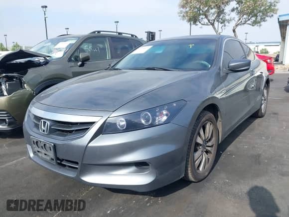 2012 Honda Accord LX-S with VIN 1HGCS1B33CA000031, listed as a IAAI auction lot 42374872 with 171,805 mi miles and . Bid and sale history available at DreamBid. Image 2.