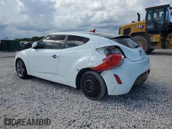 2014 Hyundai Veloster z VIN KMHTC6AD4EU194875, wystawiony jako Copart lot #84427235 z przebiegiem 127 813 mil mil oraz Szkoda całkowita • Salvage title. Historia ofert i sprzedaży dostępna na DreamBid. Obrazek 2.