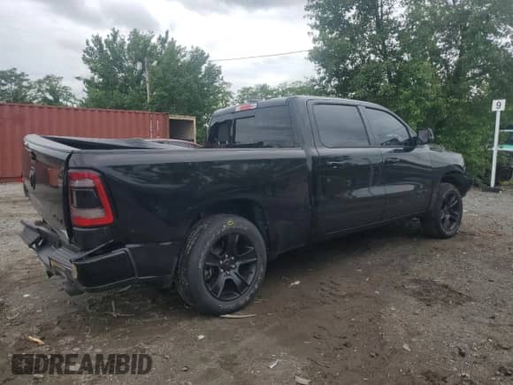2023 Ram 1500 Big Horn with VIN 1C6SRFMT1PN605624, listed as a Copart auction lot 58951045 with 35,762 mi miles and Salvage title. Bid and sale history available at DreamBid. Image 3.