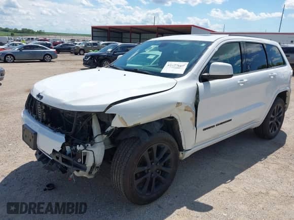 2019 Jeep Grand Cherokee Altitude with VIN 1C4RJFAG9KC840928, listed as a IAAI auction lot 42627669 with 94,334 mi miles and . Bid and sale history available at DreamBid. Image 17.
