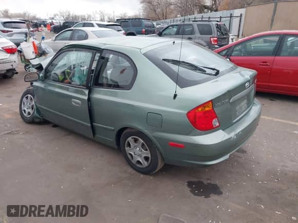 2003 Hyundai Accent GL с VIN KMHCG35C53U256981, выставлен на аукционе IAAI как лот 41317375 с пробегом 73 522 миль миль и . История ставок и продаж доступна на DreamBid. Изображение 3.