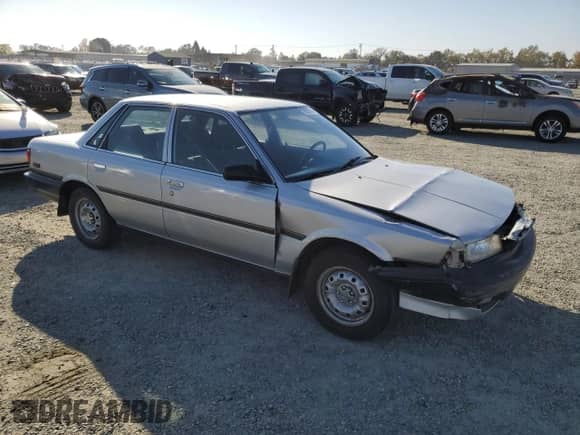 1991 Toyota Camry с VIN 4T1SV24E1MU369875, выставлен на аукционе Copart как лот 79859504 с пробегом 138 718 миль миль и Списание • Salvage title. История ставок и продаж доступна на DreamBid. Изображение 4.
