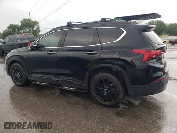 2023 Hyundai Santa Fe XRT with VIN 5NMS64AJ4PH487221, listed as a Copart auction lot 63750365 with 59,165 mi miles and Salvage title. Bid and sale history available at DreamBid. Image 2.