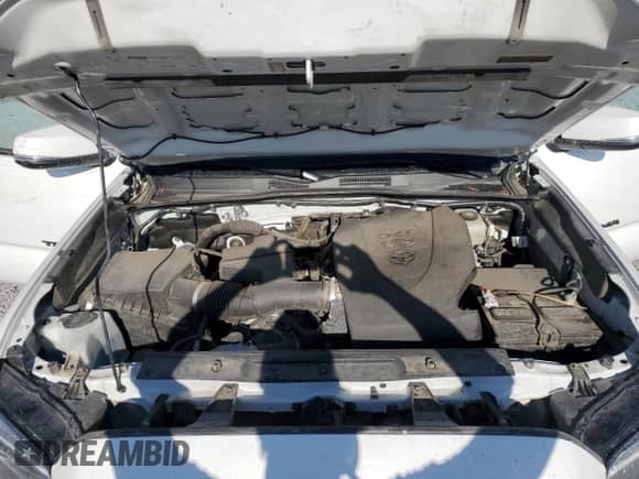 2022 Toyota Tacoma SR z VIN 3TYSZ5ANXNT090384, wystawiony jako Copart lot #80906685 z przebiegiem Nie podano mil oraz Szkoda całkowita • Salvage title. Historia ofert i sprzedaży dostępna na DreamBid. Obrazek 11.