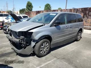 2014 Dodge Grand Caravan SE with VIN 2C4RDGBG2ER285635, listed as a Copart auction lot 70980445 with 374,791 mi miles and Salvage title. Bid and sale history available at DreamBid. Image 1.