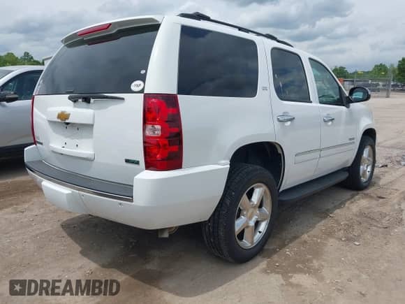 2012 Chevrolet Tahoe LTZ with VIN 1GNSKCE05CR177535, listed as a IAAI auction lot 42149054 with 184,830 mi miles and . Bid and sale history available at DreamBid. Image 4.