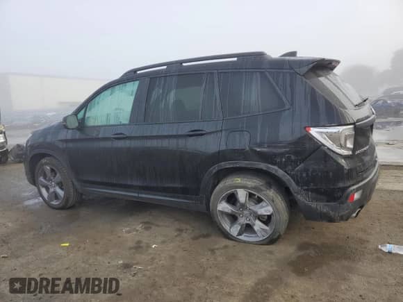 2021 Honda Passport Touring with VIN 5FNYF7H96MB011542, listed as a Copart auction lot 85740944 with 80,648 mi miles and Salvage title. Bid and sale history available at DreamBid. Image 2.