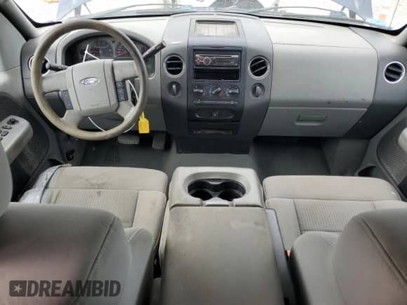 2007 Ford F-150 STX with VIN 1FTRX14W87FA77195, listed as a Copart auction lot 82258435 with 200,910 mi miles and Salvage title. Bid and sale history available at DreamBid. Image 8.