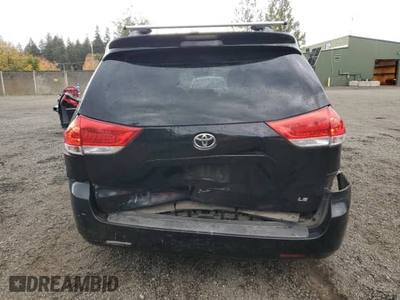2014 Toyota Sienna LE with VIN 5TDKK3DC6ES455352, listed as a Copart auction lot 82415215 with 180,284 mi miles and Salvage title. Bid and sale history available at DreamBid. Image 6.
