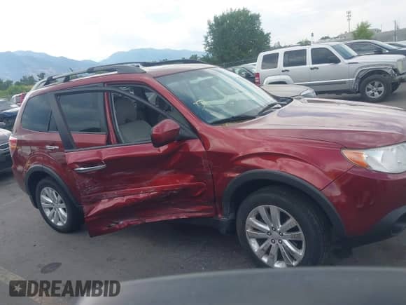 2012 Subaru Forester X Limited z VIN JF2SHBEC8CH455394, wystawiony jako IAAI lot #42730885 z przebiegiem 140 778 mil mil oraz . Historia ofert i sprzedaży dostępna na DreamBid. Obrazek 13.