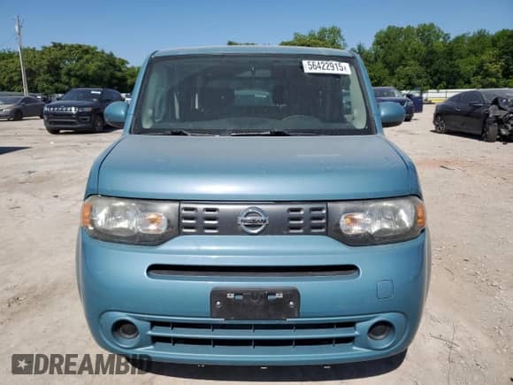 2011 Nissan Cube SL с VIN JN8AZ2KR3BT211958, выставлен на аукционе Copart как лот 56422915 с пробегом 106 854 миль миль и Списание • Salvage title. История ставок и продаж доступна на DreamBid. Изображение 5.