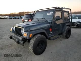2005 Jeep Wrangler SE with VIN 1J4FA29155P363501, listed as a Copart auction lot 80388314 with 97,564 mi miles and Clean title. Bid and sale history available at DreamBid. Image 1.