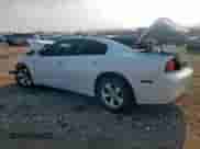 2014 Dodge Charger SE with VIN 2C3CDXBG9EH215954, listed as a Copart auction lot 69775255 with 256,827 mi miles and Salvage title. Bid and sale history available at DreamBid. Image 2.