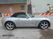 2009 Saturn Sky with VIN 1G8MC35B59Y100284, listed as a IAAI auction lot 42260987 with 86,049 mi miles and . Bid and sale history available at DreamBid. Image 13.