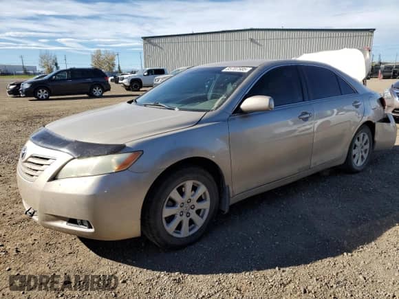 2007 Toyota Camry XLE with VIN 4T1BK46K17U506745, listed as a Copart auction lot 85707585 with 214,664 mi miles and Salvage title. Bid and sale history available at DreamBid. Image 1.