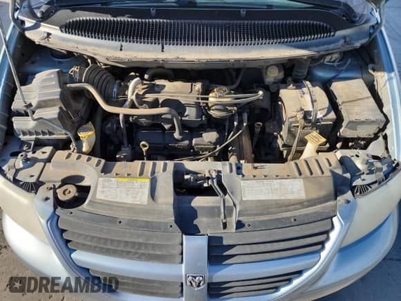 2005 Dodge Caravan SE with VIN 2D4GP24R25R362331, listed as a Copart auction lot 84256985 with 292,671 mi miles and Salvage title. Bid and sale history available at DreamBid. Image 12.