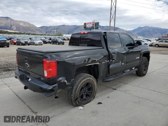 2017 Chevrolet Silverado 1500 LTZ with VIN 3GCUKSEJ0HG357386, listed as a Copart auction lot 82530165 with 82,649 mi miles and Salvage title. Bid and sale history available at DreamBid. Image 3.