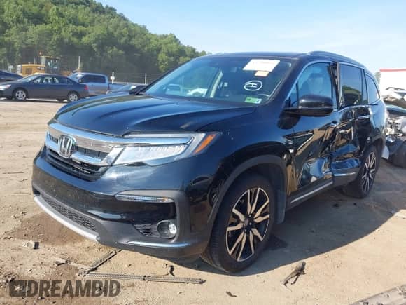 2019 Honda Pilot Touring 8-Passenger with VIN 5FNYF6H99KB011820, listed as a IAAI auction lot 42799995 with 72,904 mi miles and . Bid and sale history available at DreamBid. Image 17.