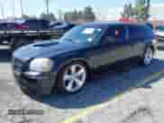 2007 Dodge Magnum SRT-8 z VIN 2D4GV773X7H654618, wystawiony jako IAAI lot #41752289 z przebiegiem 103 819 mil mil oraz . Historia ofert i sprzedaży dostępna na DreamBid. Obrazek 2.