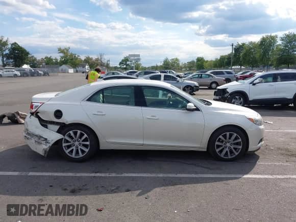 2013 Chevrolet Malibu LT with VIN 1G11E5SA0DF340379, listed as a IAAI auction lot 43095448 with 124,745 mi miles and . Bid and sale history available at DreamBid. Image 13.