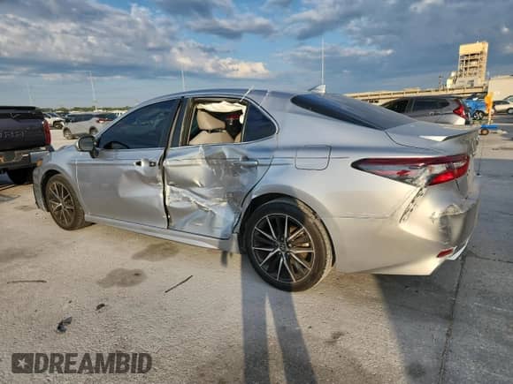 2023 Toyota Camry SE with VIN 4T1G11AK1PU807109, listed as a Copart auction lot 84289165 with 34,015 mi miles and Salvage title. Bid and sale history available at DreamBid. Image 2.
