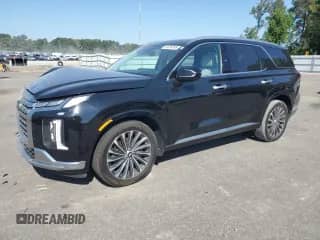 2023 Hyundai Palisade Calligraphy с VIN KM8R7DGE1PU553041, выставлен на аукционе Copart как лот 81039765 с пробегом 59 482 миль миль и Списание • Salvage title. История ставок и продаж доступна на DreamBid. Изображение 1.