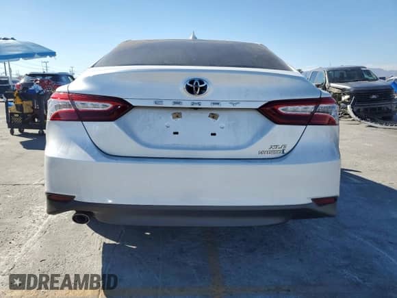 2019 Toyota Camry Hybrid LE с VIN 4T1B21HK2KU512669, выставлен на аукционе Copart как лот 67447715 с пробегом 141 772 миль миль и Списание • Salvage title. История ставок и продаж доступна на DreamBid. Изображение 6.
