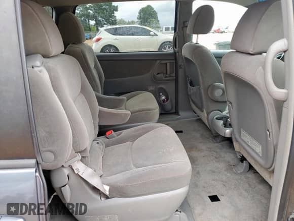 2010 Toyota Sienna LE с VIN 5TDKK4CC5AS343448, выставлен на аукционе Copart как лот 81763345 с пробегом 166 379 миль миль и Списание • Salvage title. История ставок и продаж доступна на DreamBid. Изображение 11.