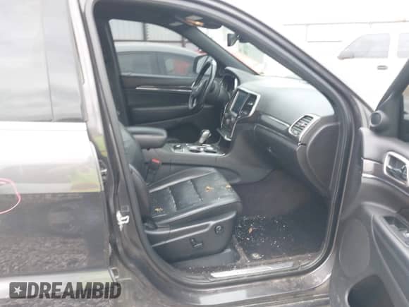 2018 Jeep Grand Cherokee Overland with VIN 1C4RJFCG3JC190702, listed as a IAAI auction lot 42017900 with 131,843 mi miles and . Bid and sale history available at DreamBid. Image 5.