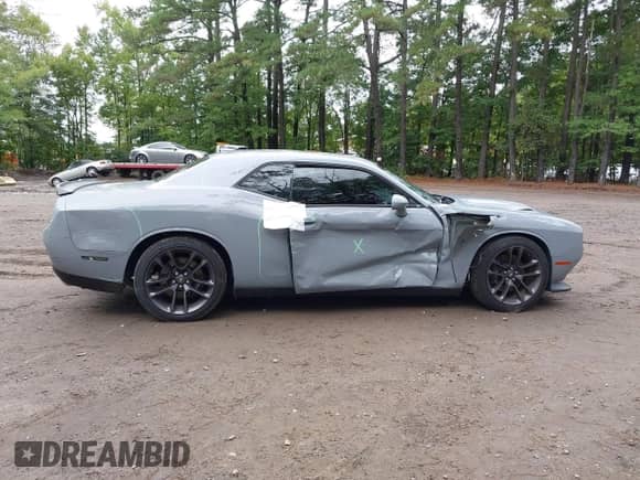 2022 Dodge Challenger R/T Scat Pack Widebody with VIN 2C3CDZFJXNH140568, listed as a IAAI auction lot 43259878 with 18,659 mi miles and . Bid and sale history available at DreamBid. Image 6.