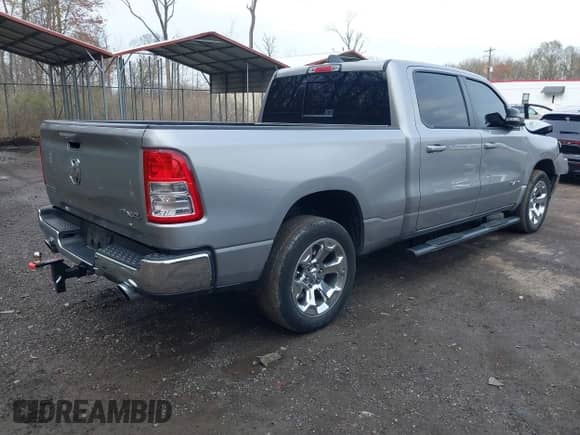 2022 Ram 1500 Big Horn with VIN 1C6SRFMT6NN366424, listed as a IAAI auction lot 41958267 with 72,896 mi miles and . Bid and sale history available at DreamBid. Image 4.