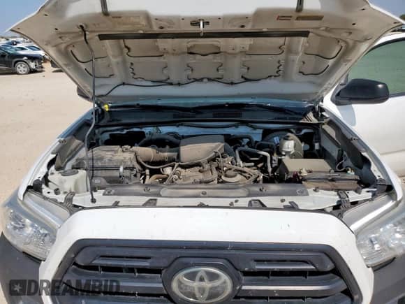 2019 Toyota Tacoma SR z VIN 5TFRX5GN9KX156923, wystawiony jako Copart lot #80000885 z przebiegiem 101 823 mil mil oraz Szkoda całkowita • Salvage title. Historia ofert i sprzedaży dostępna na DreamBid. Obrazek 11.