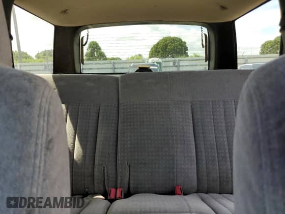 2000 Chevrolet Blazer LS with VIN 1GNCS13W62K142736, listed as a Copart auction lot 73249844 with 141,788 mi miles and Salvage title. Bid and sale history available at DreamBid. Image 10.