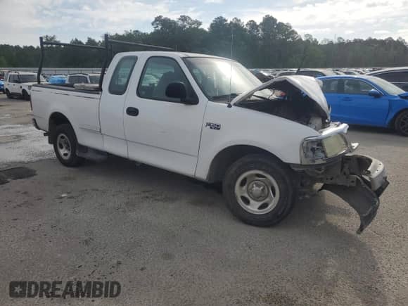 2004 Ford F-150 XL с VIN 2FTRX17294CA68652, выставлен на аукционе Copart как лот 53442525 с пробегом Не указан миль и Списание • Salvage title. История ставок и продаж доступна на DreamBid. Изображение 4.