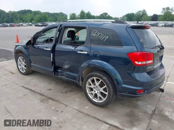 2014 Dodge Journey Limited with VIN 3C4PDCDG0ET156092, listed as a IAAI auction lot 42687119 with 174,036 mi miles and . Bid and sale history available at DreamBid. Image 3.