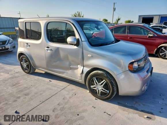 2010 Nissan Cube S Krom Edition with VIN JN8AZ2KR2AT157695, listed as a Copart auction lot 69221075 with 171,973 mi miles and Salvage title. Bid and sale history available at DreamBid. Image 4.