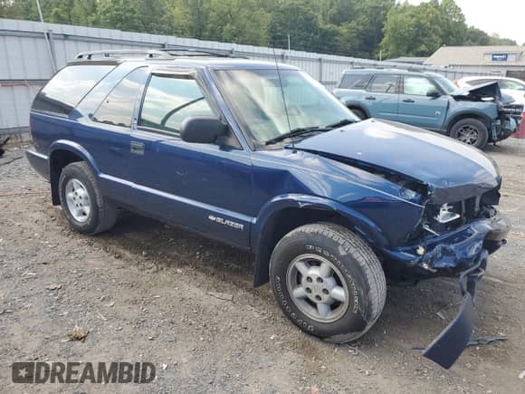 2000 Chevrolet Blazer LS с VIN 1GNCT18W3YK104430, выставлен на аукционе Copart как лот 68858864 с пробегом 47 342 миль миль и Списание • Salvage title. История ставок и продаж доступна на DreamBid. Изображение 4.