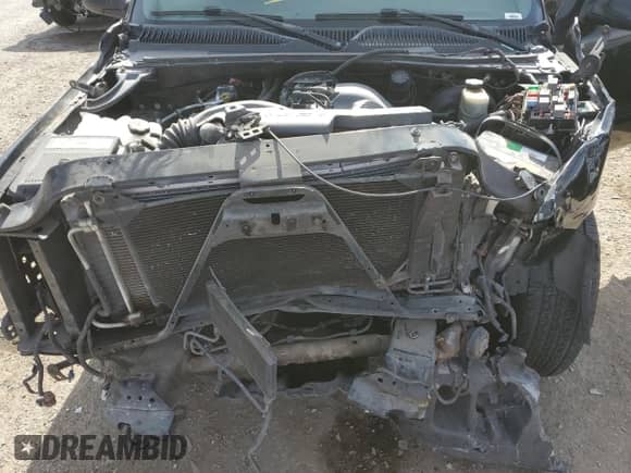 2002 GMC Sierra 1500 Denali z VIN 2GTFK69U521173050, wystawiony jako Copart lot #84276954 z przebiegiem Nie podano mil oraz Szkoda całkowita • Salvage title. Historia ofert i sprzedaży dostępna na DreamBid. Obrazek 11.