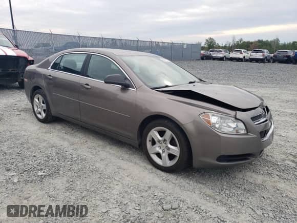 2011 Chevrolet Malibu LS with VIN 1G1ZB5EU8BF370860, listed as a Copart auction lot 69911275 with 103,608 mi miles and Salvage title. Bid and sale history available at DreamBid. Image 4.