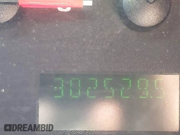 2006 Ford Econoline Cargo with VIN 1FTNE24W06HA21135, listed as a IAAI auction lot 42395308 with 302,529 mi miles and . Bid and sale history available at DreamBid. Image 7.