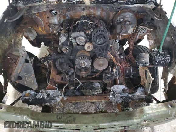 2004 Chevrolet Silverado 1500 LS с VIN 1GCEK14T14E306756, выставлен на аукционе Copart как лот 79057094 с пробегом Не указан миль и Списание • Salvage title. История ставок и продаж доступна на DreamBid. Изображение 11.