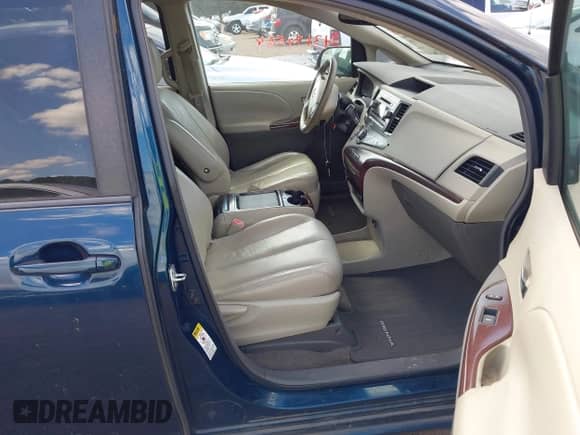 2011 Toyota Sienna XLE AAS with VIN 5TDYK3DC7BS121451, listed as a IAAI auction lot 43174564 with 268,726 mi miles and . Bid and sale history available at DreamBid. Image 5.